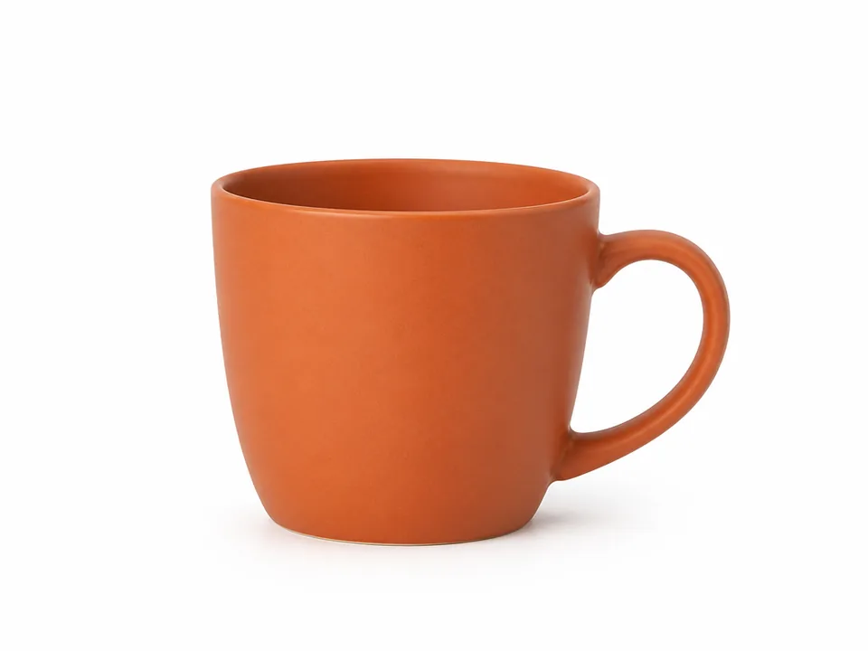 Terracotta mug on a white background